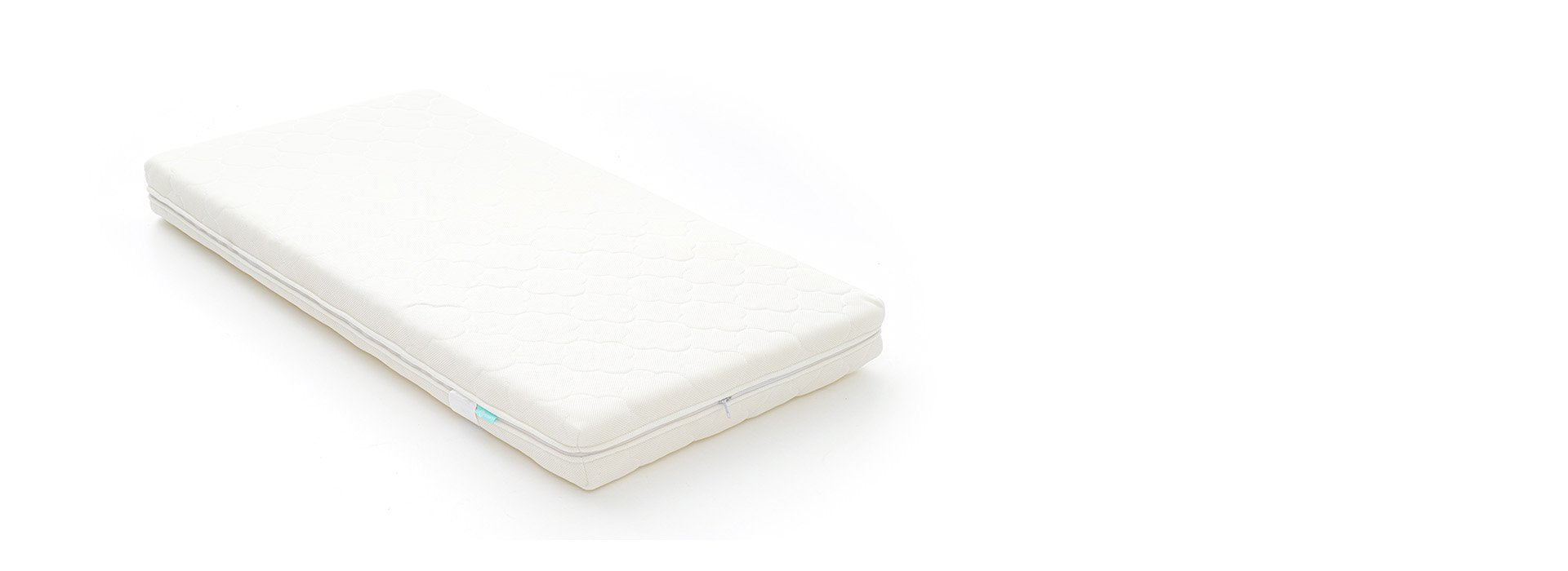 Baby mattress, left side angle view.