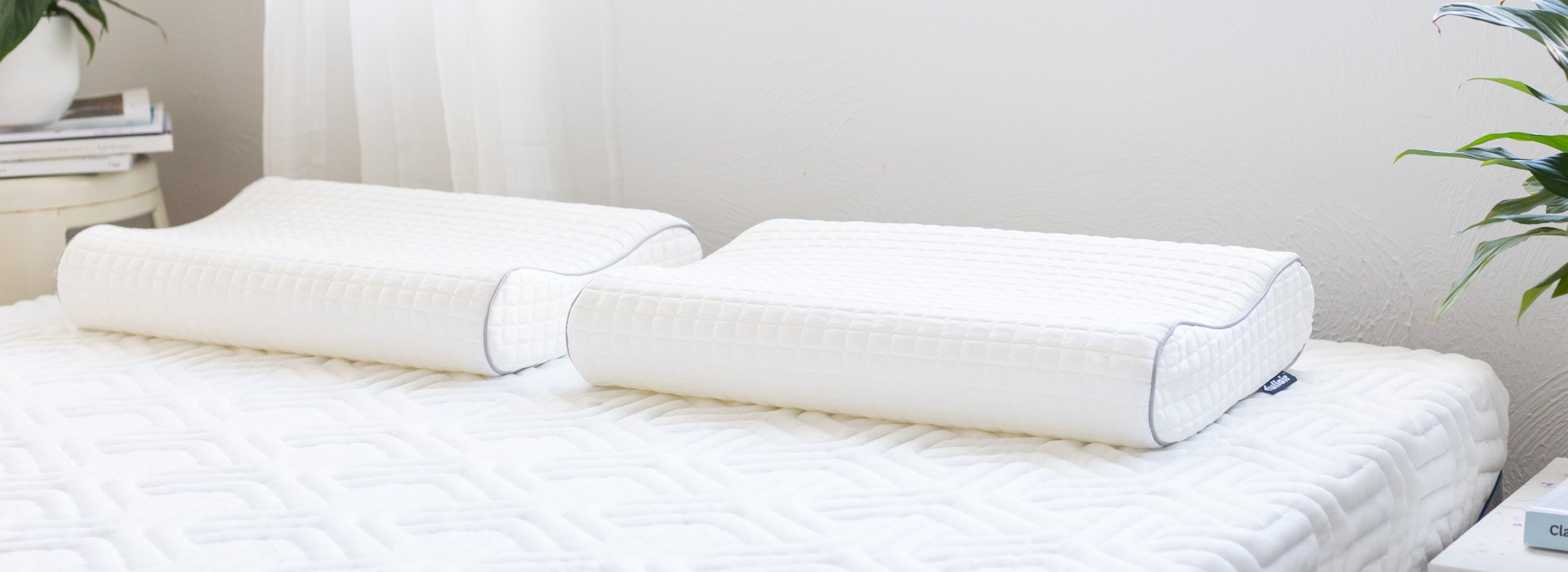 Two Fullair pillows on a mattress.
